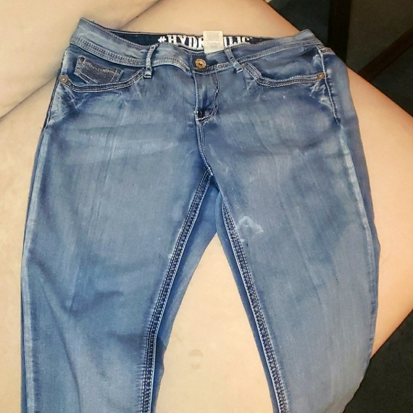 Hydraulic distressed washed out slim boot jeans